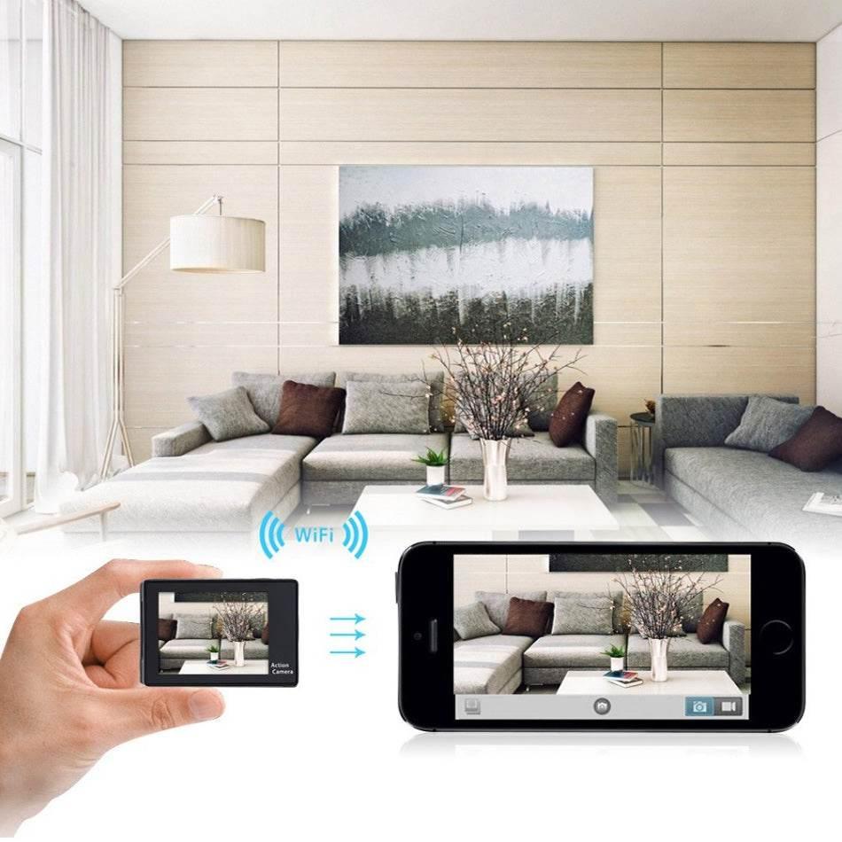 4K waterproof action camera showing live WiFi video streaming to smartphone in modern living room