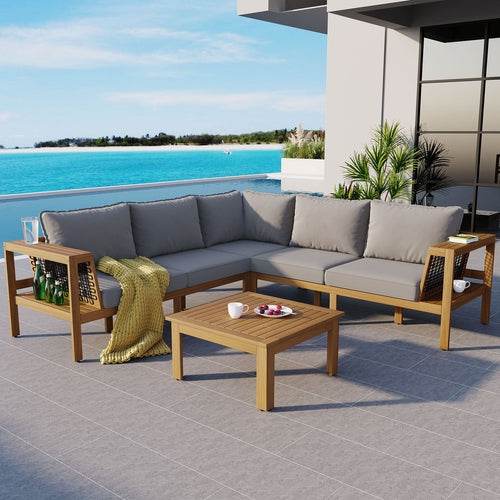 Sangria Beech luxury outdoor seating for backyard featuring a wooden sectional sofa with gray cushions and matching coffee table