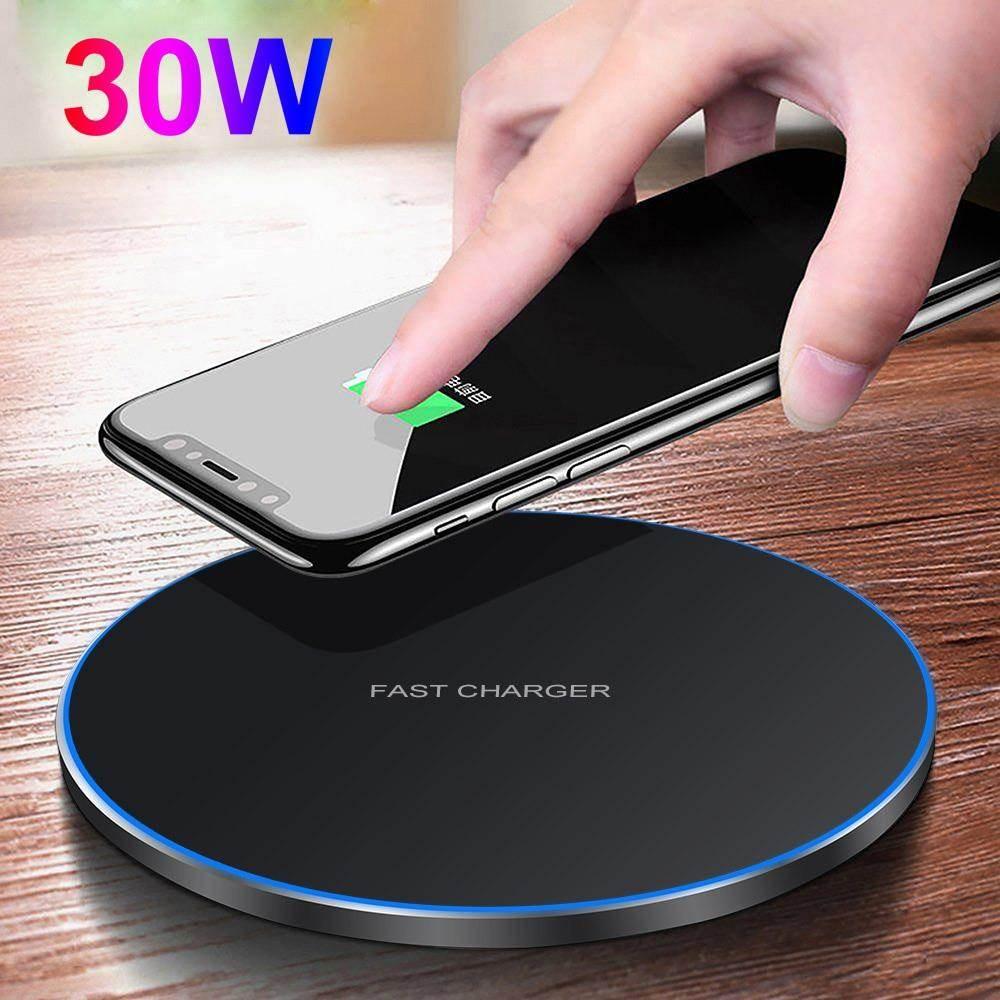 Yellow Pandora premium wireless charging station fast charger with 30W power and smartphone on wooden surface