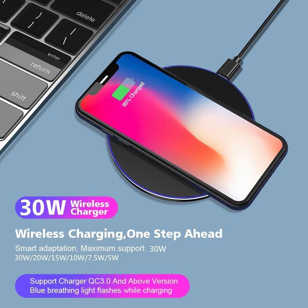 Yellow Pandora premium wireless charging station with black phone charging on laptop keyboard