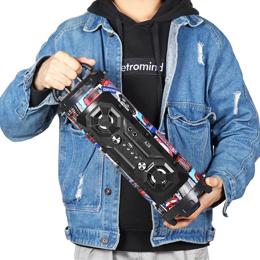 Person holding Yellow Pandora superior sound bluetooth party speaker with colorful design and dual speakers