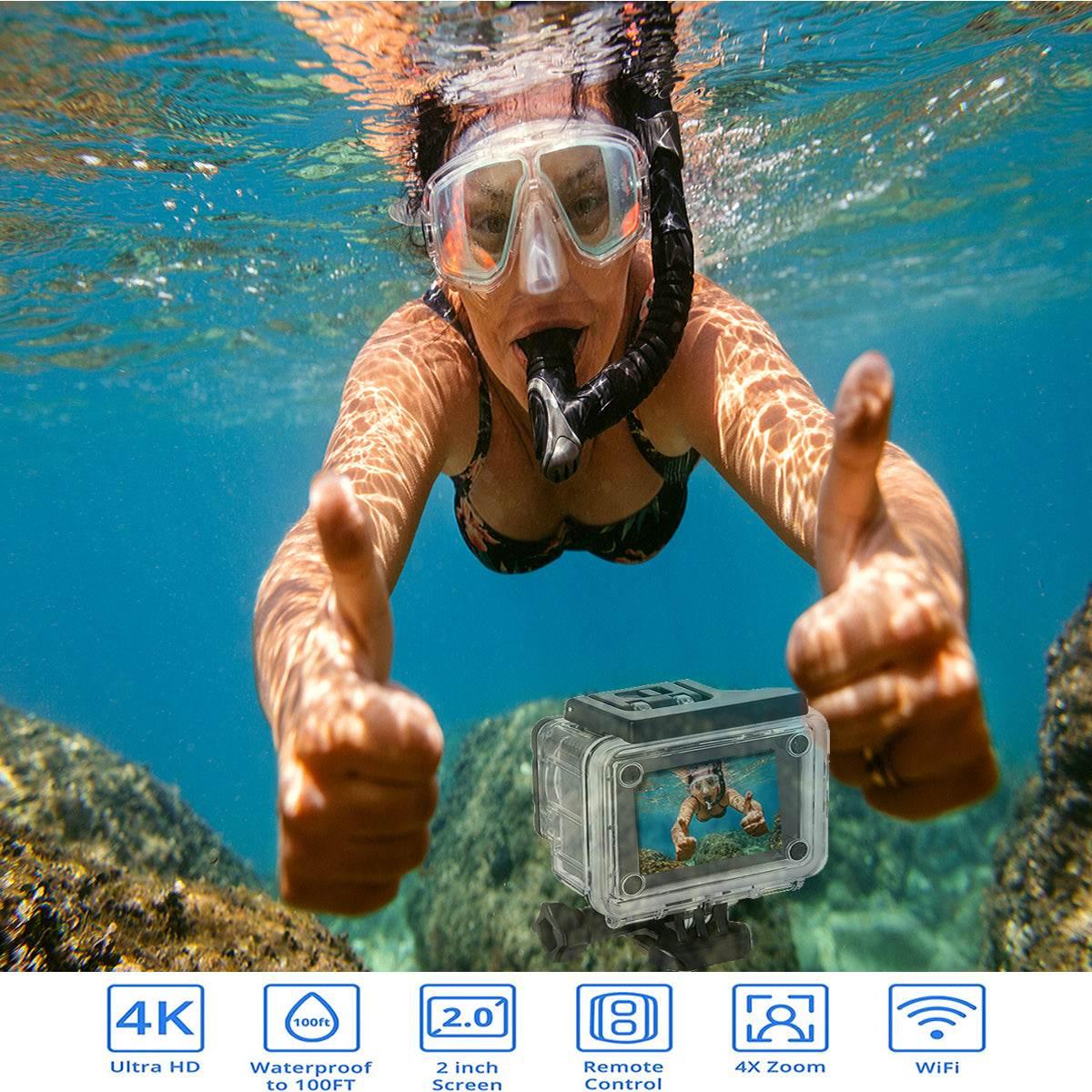 4K waterproof action camera underwater with snorkeler giving thumbs up